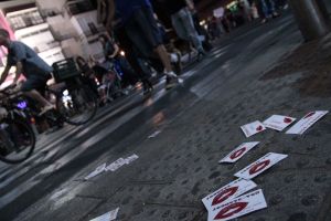 Stripper/prostitute flier cards litter the streets of Tel Aviv at night