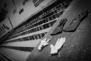 Or in this case, gloves drying on the street in Hong Kong. Not a very interesting picture, but closer to interesting once it's B&W