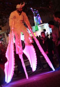 The Lightwalker strides and mingles with a smile