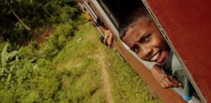 "Just relax and enjoy the ride" advises Sri Lankan train kid