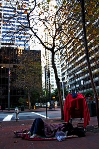 homeless man sleeping on the street in SF