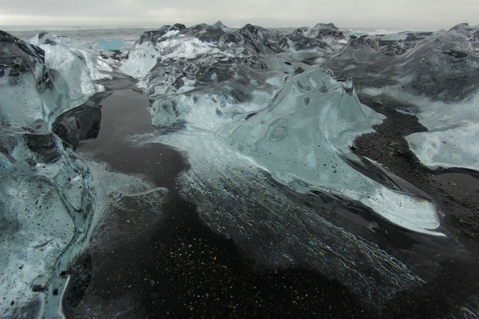 Ice beach below glacial lagoon, Iceland, travel photos