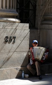 It's almost certain he'll make more with an accordion on the tourist street than he would as a surgeon here.