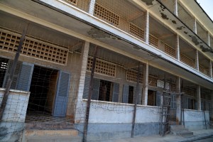 Flimsy barbed wire, strong enough to keep the ruined people inside from seeking escape through suicide