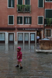 Child in the rain, Venice