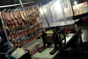 I didn't get a photo of my Buddhist savior, but I did get his neighbor's squid collection, later that night