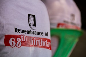 I stopped by Aung Sun Suu Kyi's birthday party, which was fantastic. But why were the shirts in English? (About 100 languages are spoken in Myanmar. Oh.)
